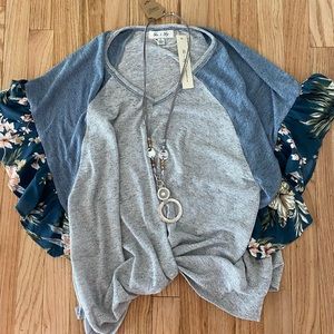 She & Sky knit with sheer floral flutter sleeves